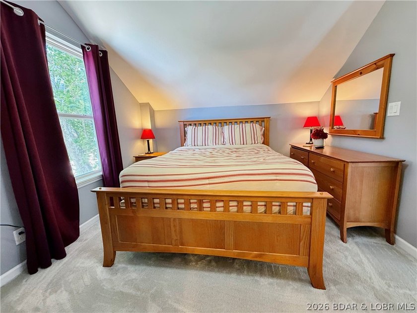 Lake life just got a serious glow-up! This beautifully remodeled - photo 48