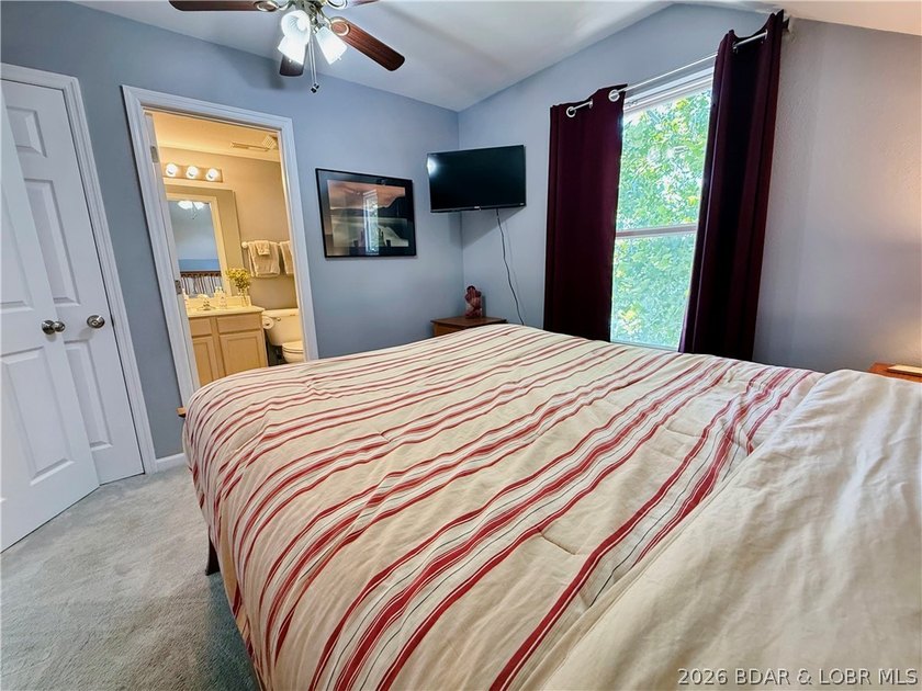 Lake life just got a serious glow-up! This beautifully remodeled - photo 49