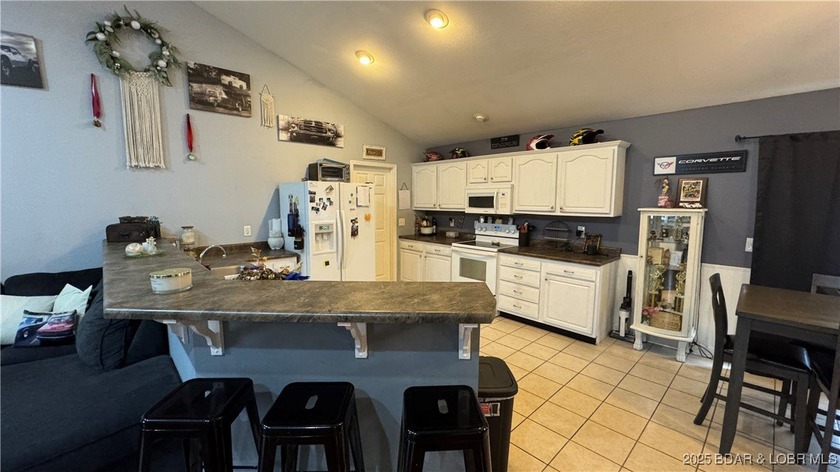 Welcome to your dream home in Gravois Mills! This delightful - photo 10