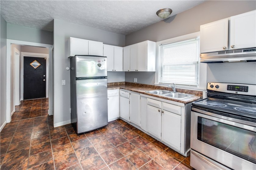 Located in Rochester's 19th Ward proper! This move-in-ready home - photo 7