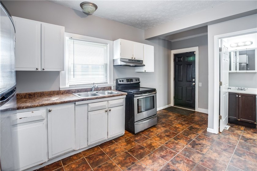 Located in Rochester's 19th Ward proper! This move-in-ready home - photo 8