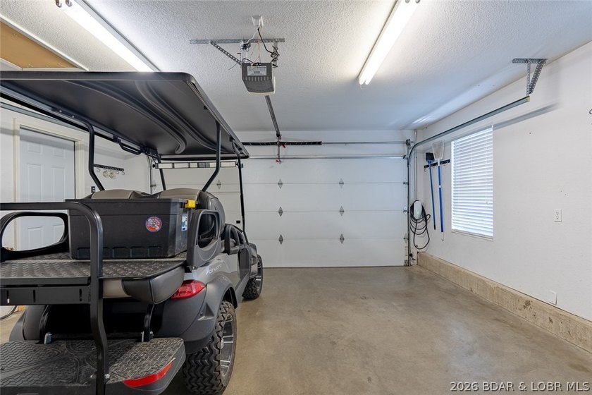 Located on a quiet cul-de-sac w/seasonal lake view in the highly - photo 18