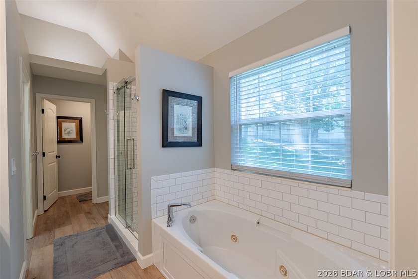Located on a quiet cul-de-sac w/seasonal lake view in the highly - photo 21