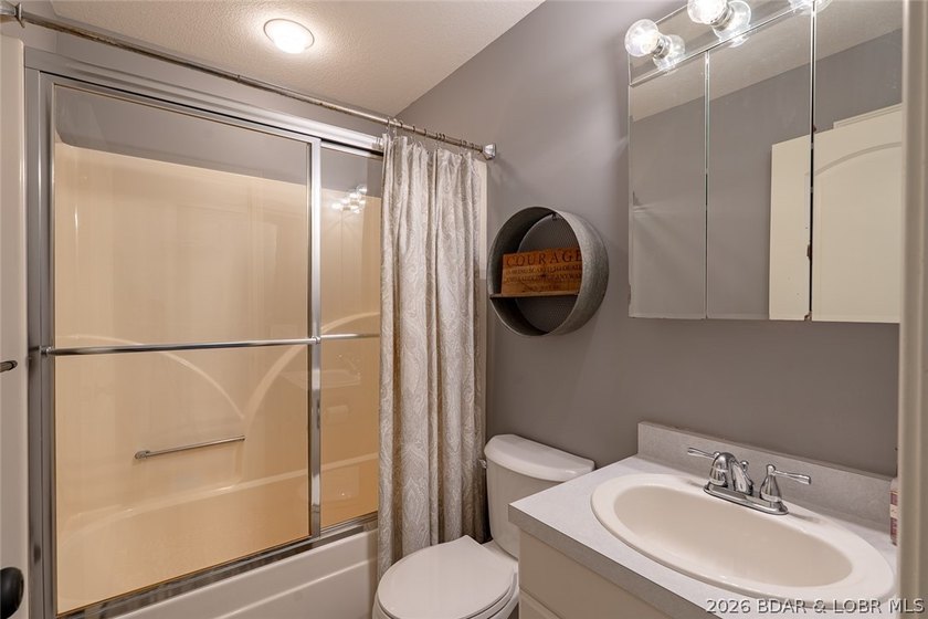 Located on a quiet cul-de-sac w/seasonal lake view in the highly - photo 28
