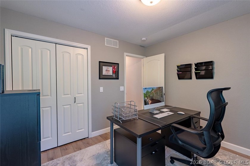Located on a quiet cul-de-sac w/seasonal lake view in the highly - photo 30