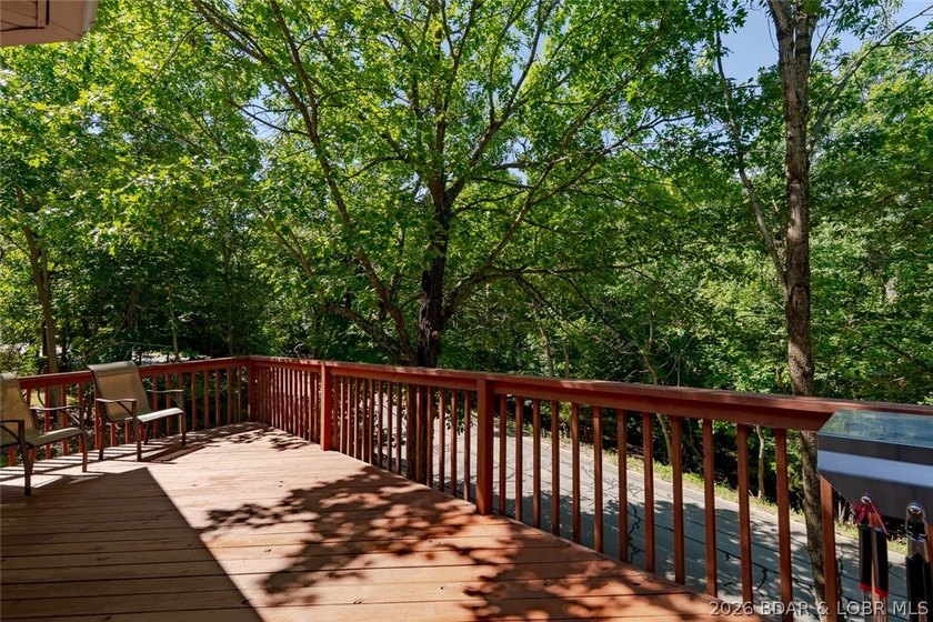 Located on a quiet cul-de-sac w/seasonal lake view in the highly - photo 31