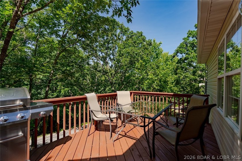 Located on a quiet cul-de-sac w/seasonal lake view in the highly - photo 32