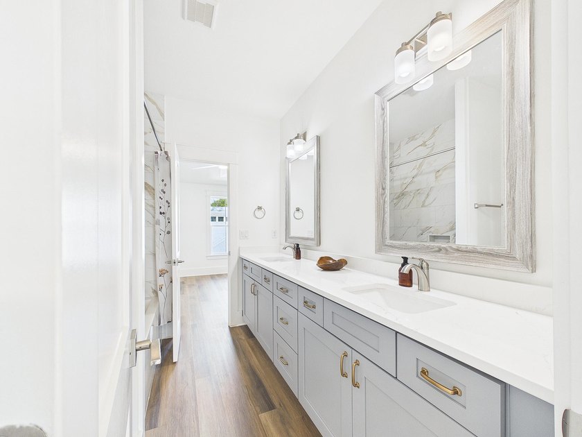 Discover coastal charm and modern luxury in this stunning Point - photo 34