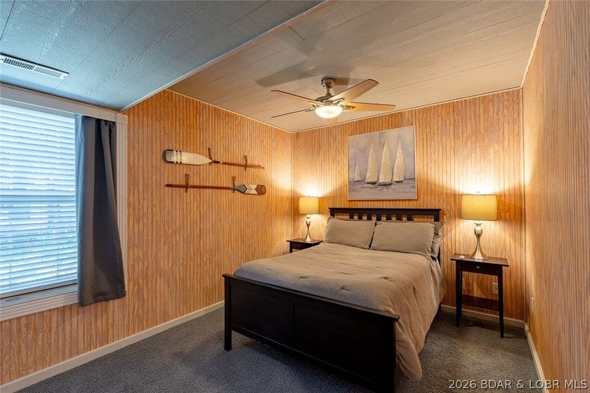 Located on a quiet cul-de-sac w/seasonal lake view in the highly - photo 48