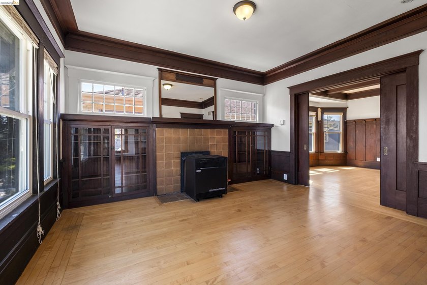 This beautifully preserved 1910 duplex blends timeless character - photo 17