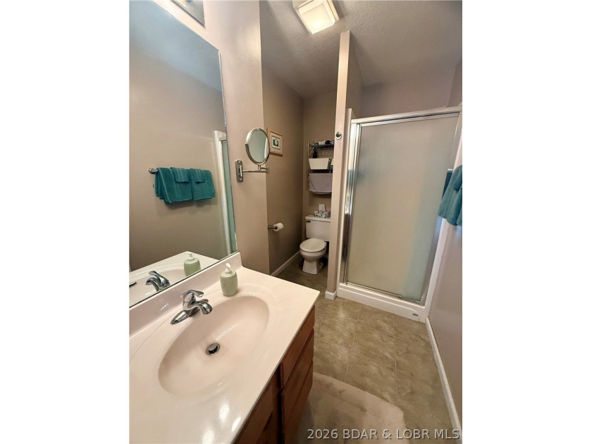 Hidden Gem Lakefront Home at the 3 MM! Nestled in a deep cove - photo 18