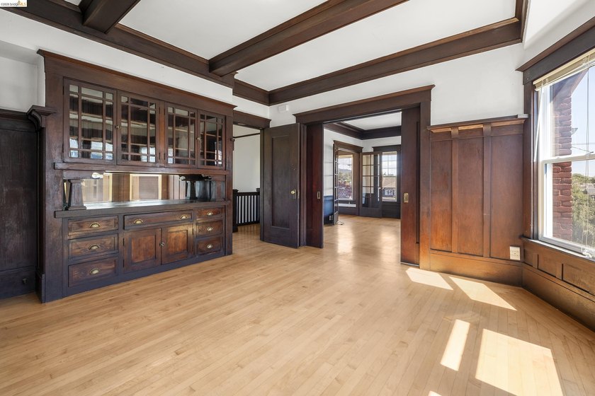 This beautifully preserved 1910 duplex blends timeless character - photo 22