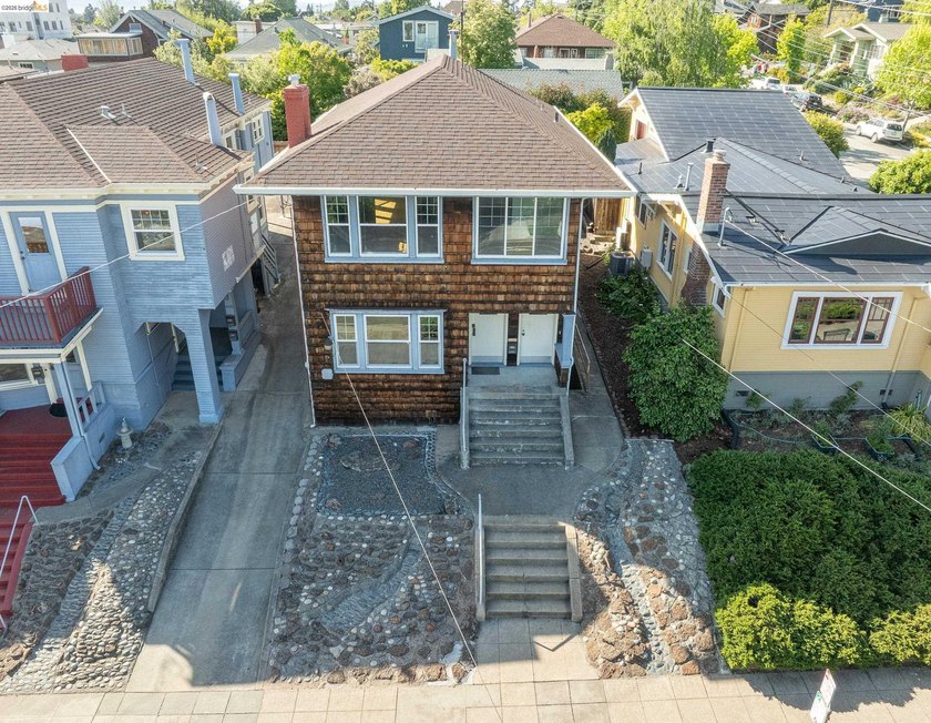 This beautifully preserved 1910 duplex blends timeless character - photo 29