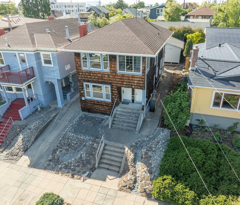 This beautifully preserved 1910 duplex blends timeless character - photo 30