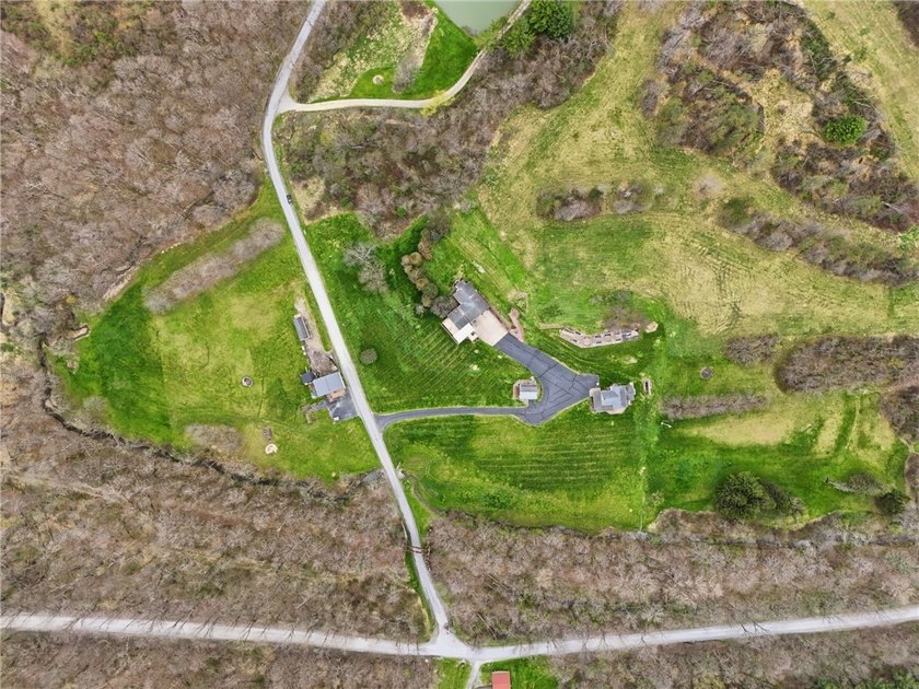 79 acres. Three homes. Two detached garages. Endless - photo 50