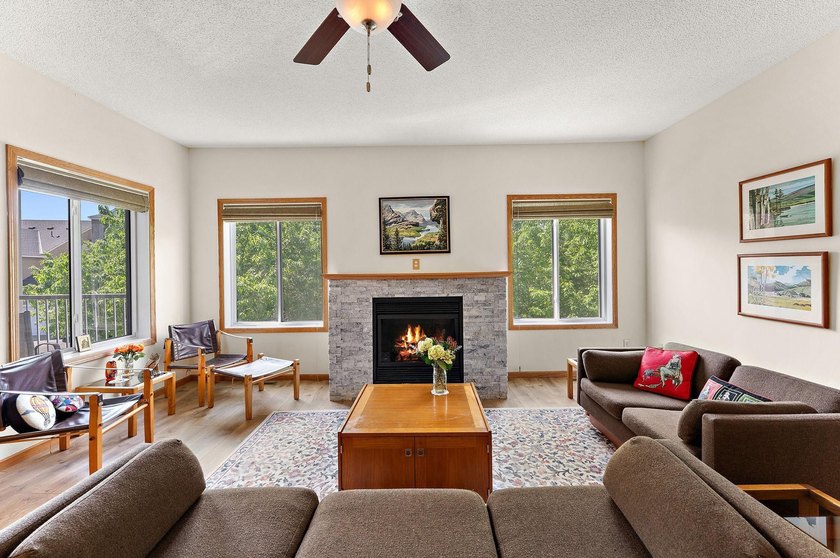 This home offers an open main level defined by natural light - photo 6