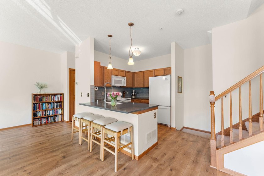 This home offers an open main level defined by natural light - photo 10