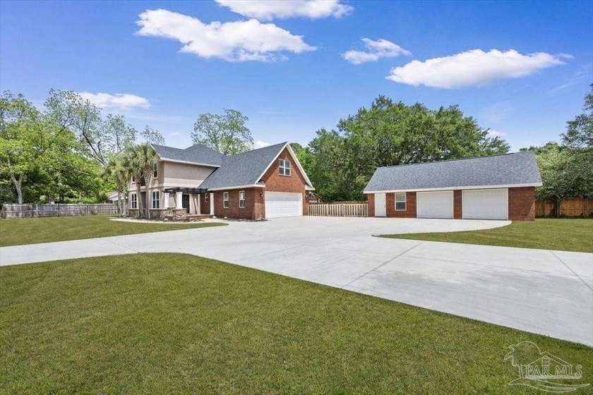 This impressive two-story home showcases timeless curb appeal - photo 8