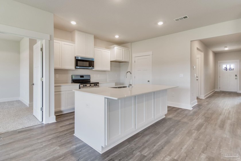NEW floorplan, the 'LAMAR', is a well-designed 1 story model - photo 3