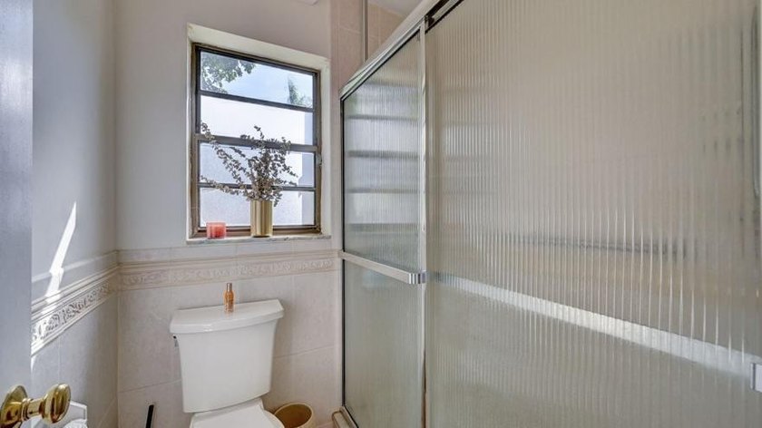 STUNNING CORNER VILLA!! in the highly desirable Canary Palm Club - photo 28