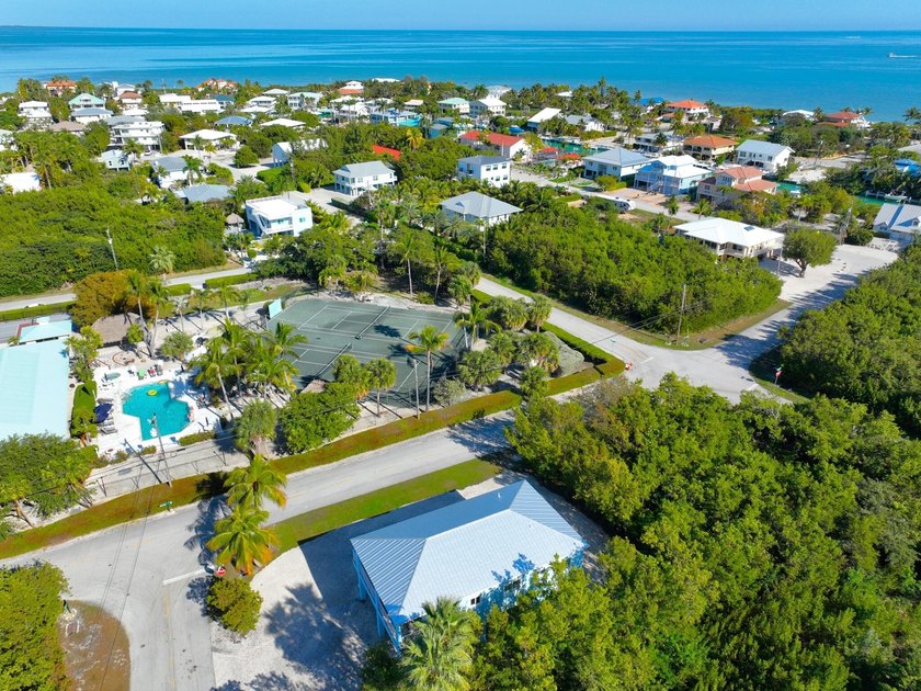 Perfectly positioned on a coveted CORNER LOT just steps from - photo 21
