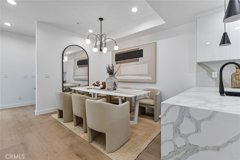 NEW CONSTRUCTION 3 bed, 2.5 bath, three-story townhome with sky - photo 7