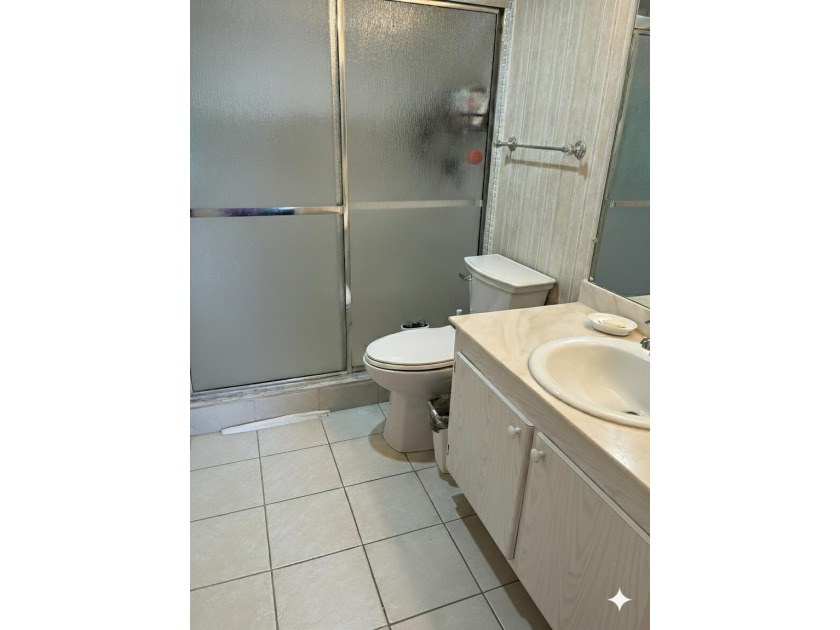 Welcome home to this spacious 2-bedroom, 2-bathroom first-floor - photo 11
