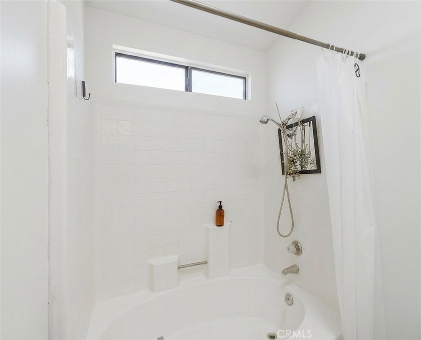 Welcome home to this charming two-story residence located in the - photo 13