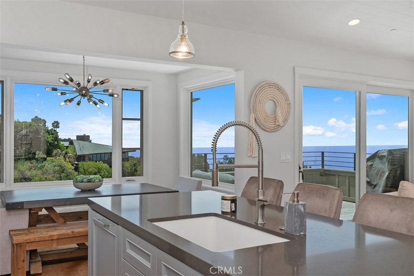 Enjoy sweeping ocean views from this 4-bedroom, 3.5-bathroom - photo 14