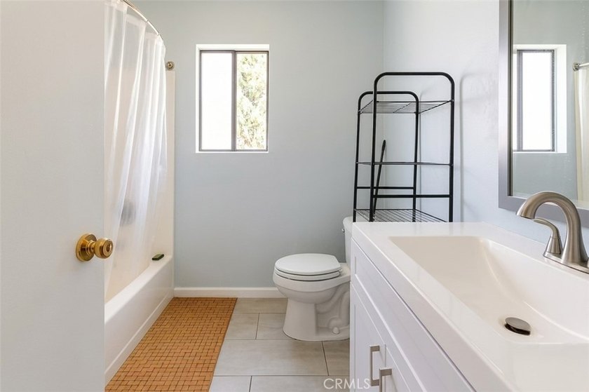Welcome home to this charming two-story residence located in the - photo 15
