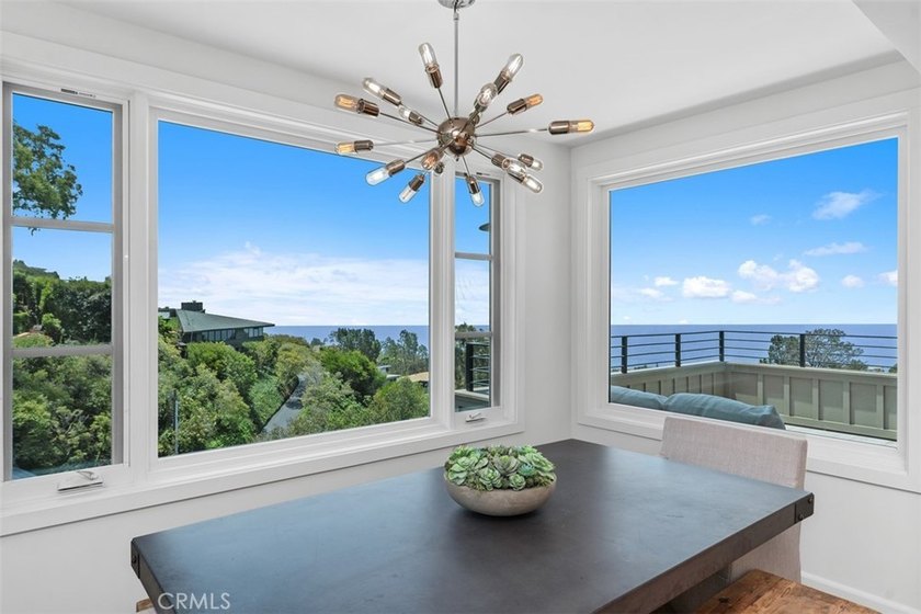 Enjoy sweeping ocean views from this 4-bedroom, 3.5-bathroom - photo 18