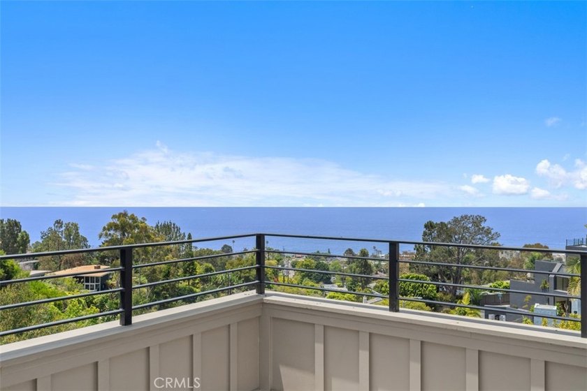 Enjoy sweeping ocean views from this 4-bedroom, 3.5-bathroom - photo 21