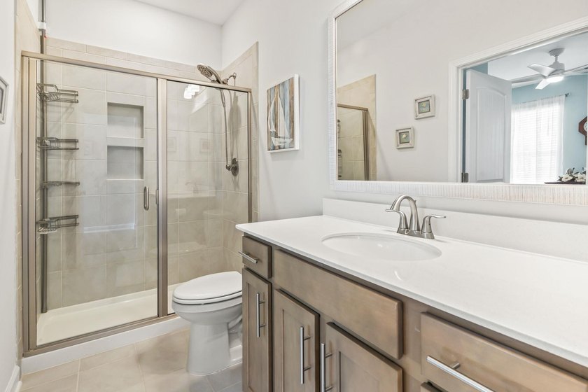 Three-bedroom, three-bathroom Craftsman-style home with a - photo 18