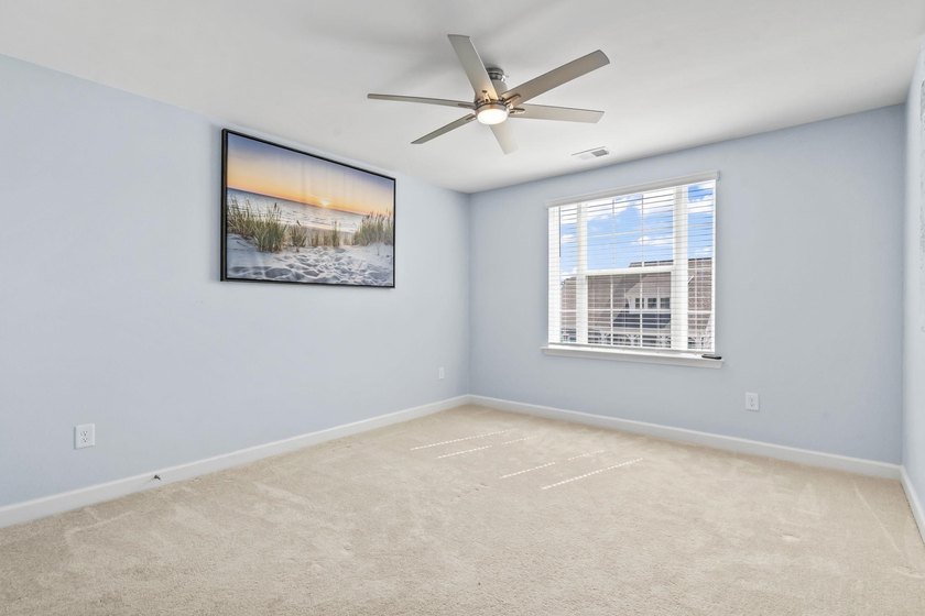 Three-bedroom, three-bathroom Craftsman-style home with a - photo 23