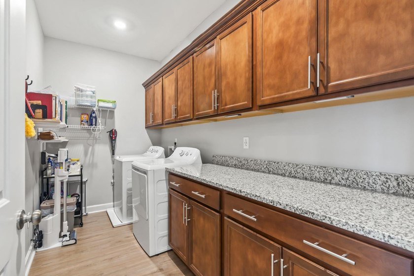 Three-bedroom, three-bathroom Craftsman-style home with a - photo 25