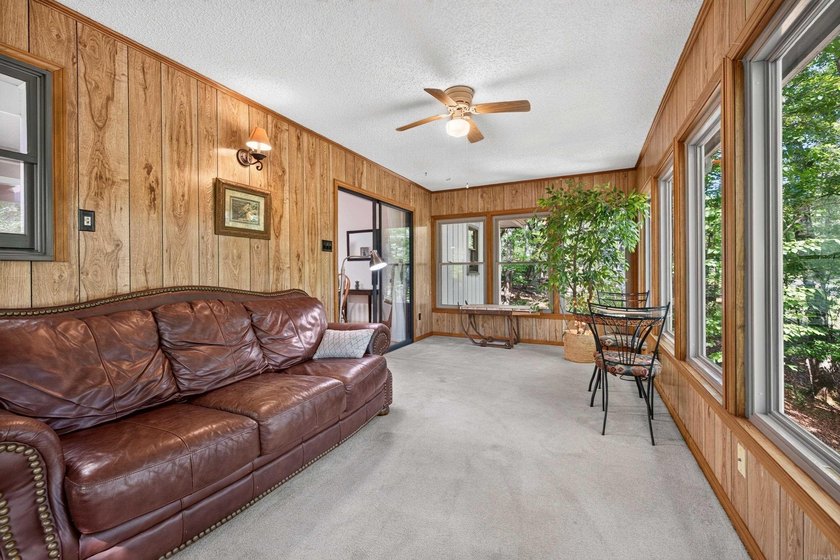 Enjoy this cute home on a private 1/3 acre lot between Lake - photo 13