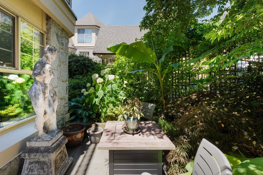 Tucked away behind your own private fenced garden oasis, this - photo 13