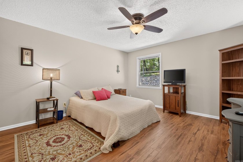 Enjoy this cute home on a private 1/3 acre lot between Lake - photo 17