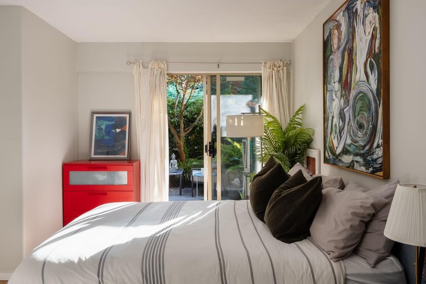 Tucked away behind your own private fenced garden oasis, this - photo 23