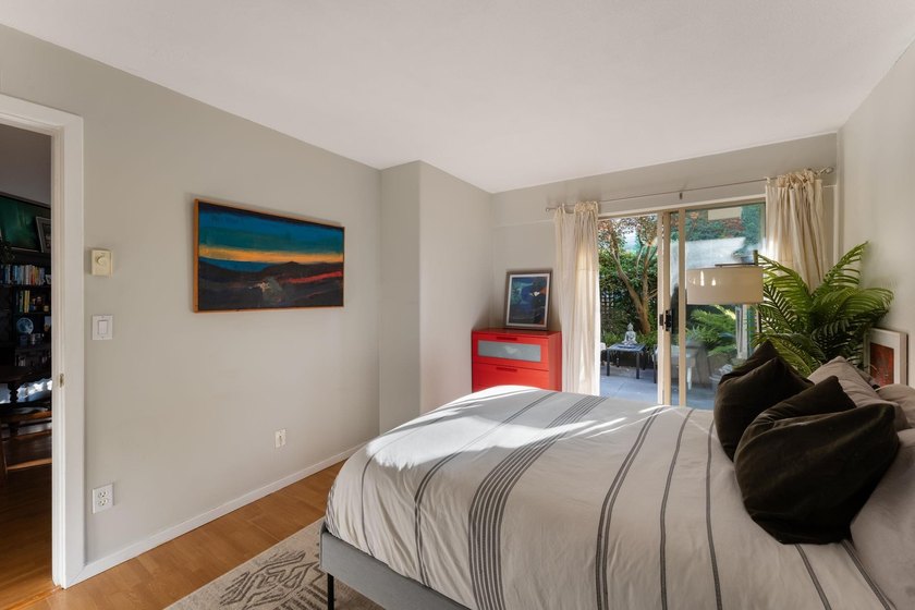 Tucked away behind your own private fenced garden oasis, this - photo 24