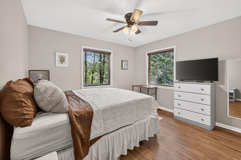 Enjoy this cute home on a private 1/3 acre lot between Lake - photo 25