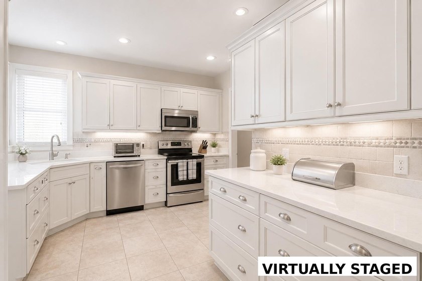 Nestled in a beautiful lakefront setting, this all-brick - photo 16