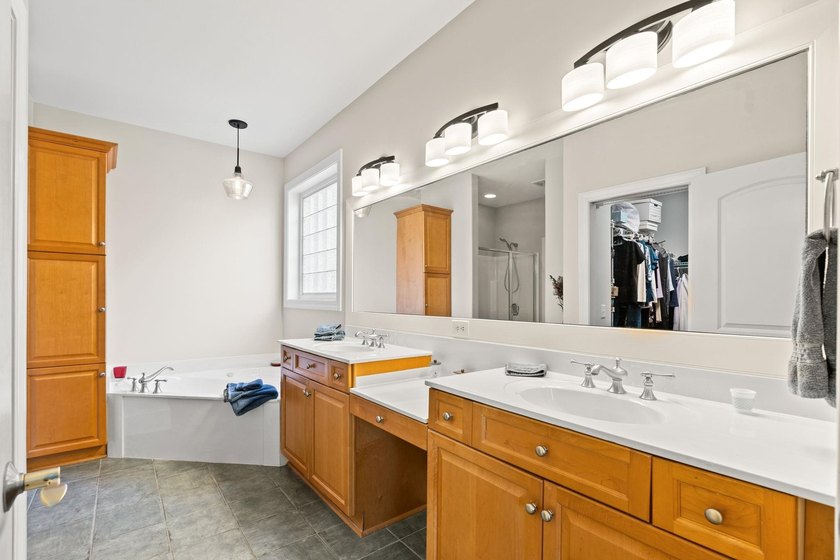 Nestled in a beautiful lakefront setting, this all-brick - photo 25