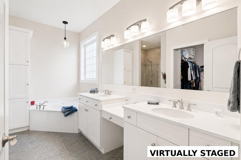 Nestled in a beautiful lakefront setting, this all-brick - photo 26