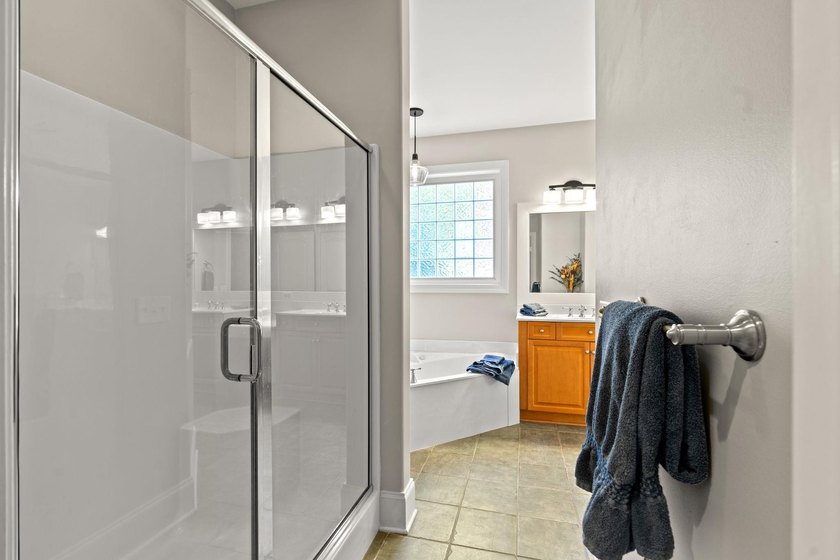 Nestled in a beautiful lakefront setting, this all-brick - photo 27