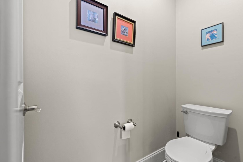 Nestled in a beautiful lakefront setting, this all-brick - photo 28