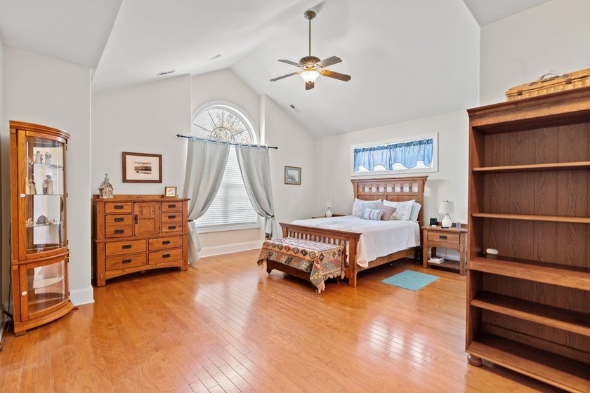 Nestled in a beautiful lakefront setting, this all-brick - photo 29