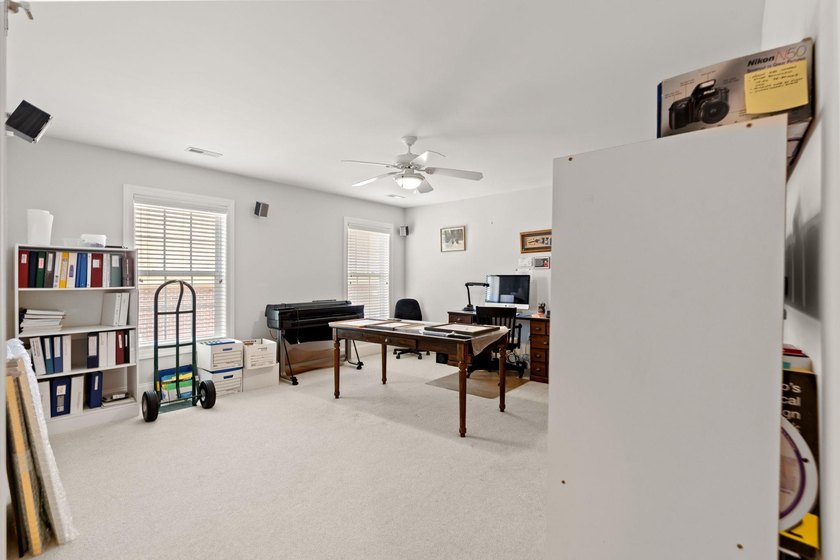 Nestled in a beautiful lakefront setting, this all-brick - photo 36