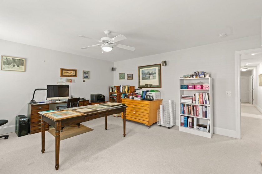 Nestled in a beautiful lakefront setting, this all-brick - photo 37