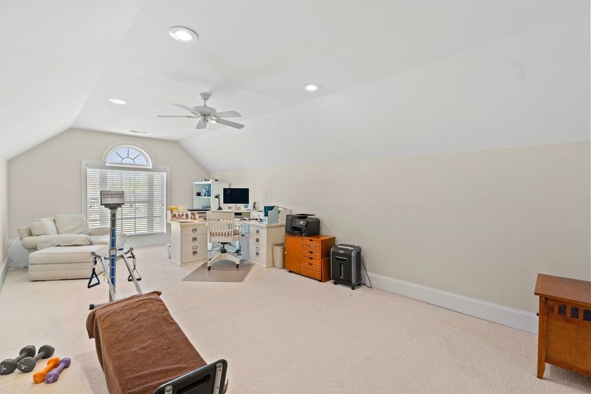 Nestled in a beautiful lakefront setting, this all-brick - photo 39